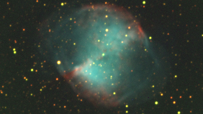 image of the Dumbbell Nebula, a planetary nebula, taken by telescope
