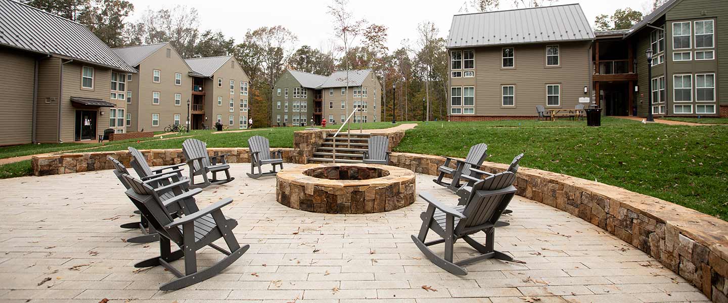 The new Groves Residence Hall with the stone courtyard in view