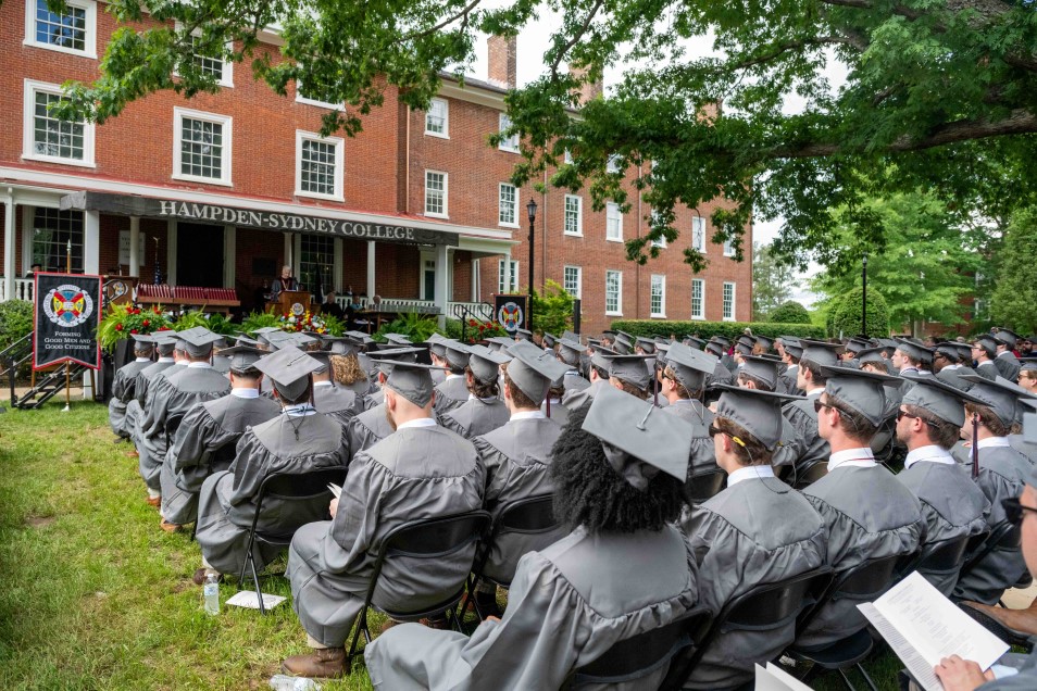 students attending the commencement ceremony at Venalble Hall lawn