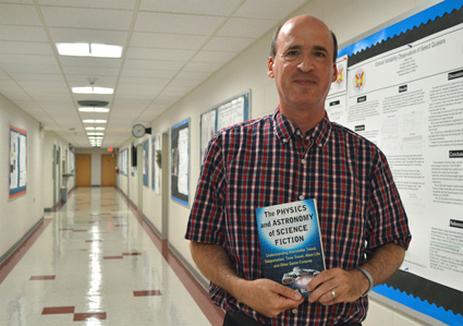 Dr. Bloom with a book