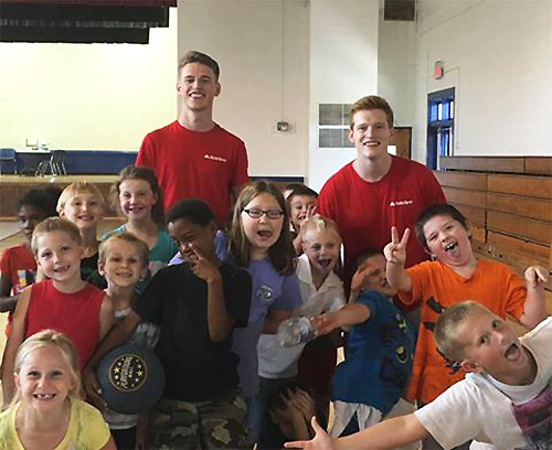 Zach Miksovic working with the boys and girls club