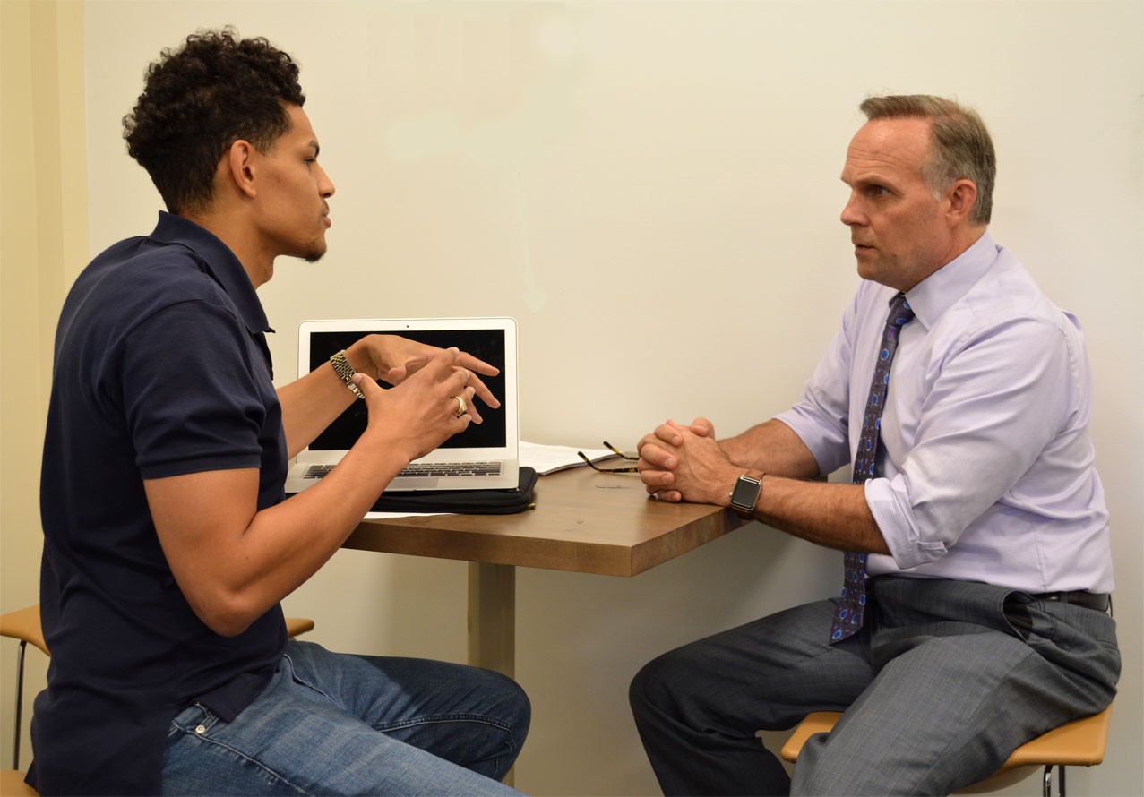 A student works with Daniel Morris, Entrepreneur in Residence.