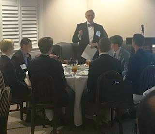Tommy Shomo '69 leads the Etiquette Dinner