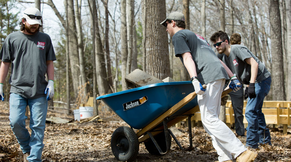 Students help build an outdoor classroom at Prince Edward County High School.