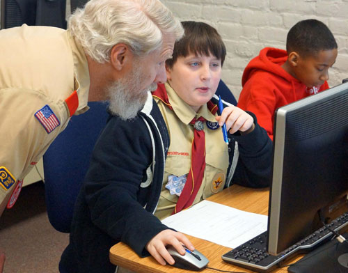 Dr. Koether, H-SC professor works with a local Boy Scout