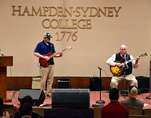 Neil and Ken Townsend play guitar at the talent show.