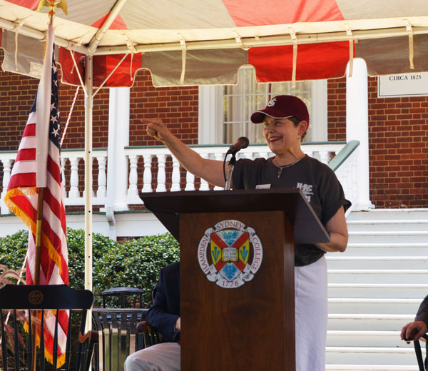 Anita Garland, Dean of Admissions addresses orientation crowd