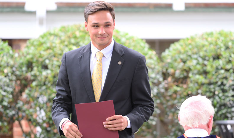 Elijah Wayne Strong ’20 receiving the President's Award for Overall Academic Excellence.