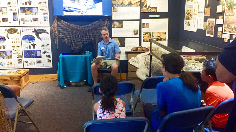 Intern teaching to children about bats at Hatteras Island 
