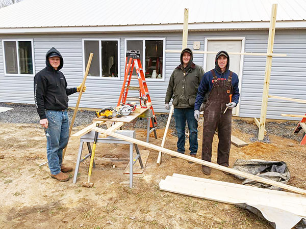 Hampden-Sydney student volunteers on a Habitat for Humanity building site