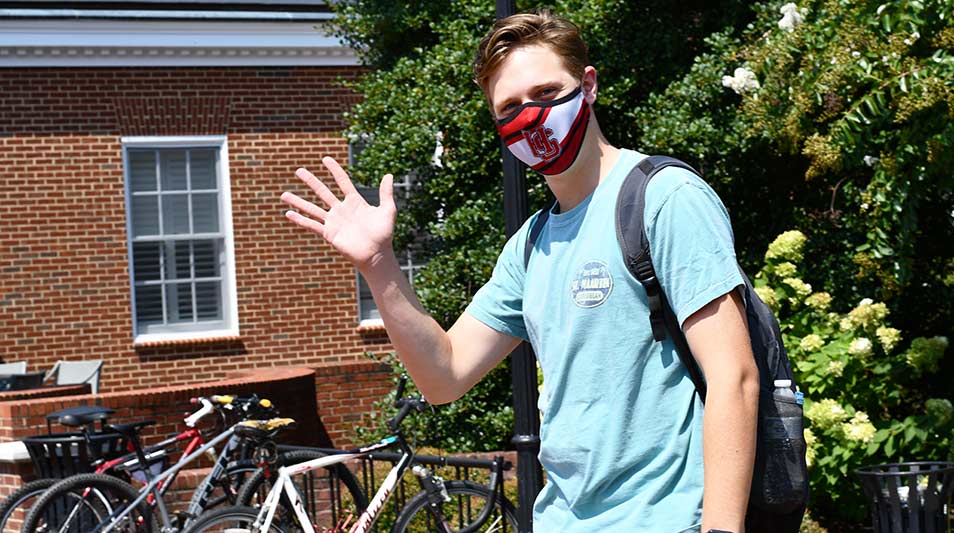 a student wearing an H-SC mask