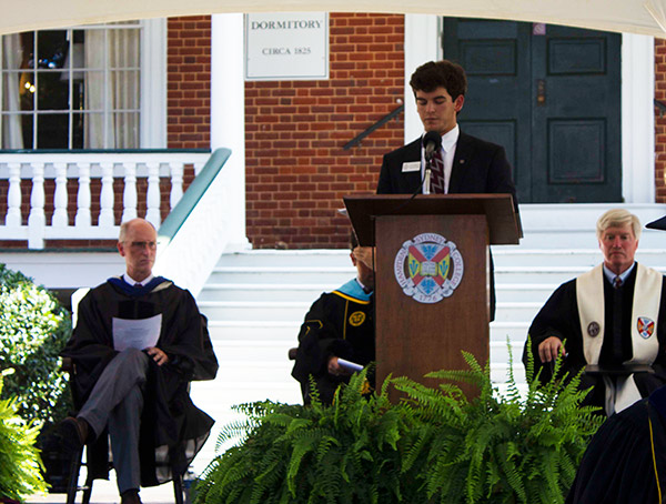 Student leader addresses the student bodyat opening convocation on the steps of Venable Hall