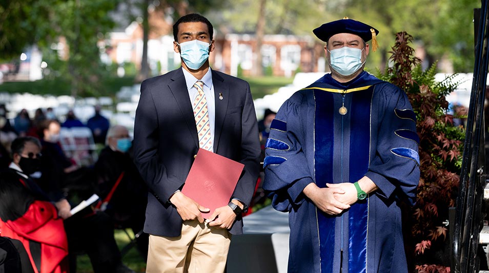 Hampden-Sydney student and professor posing for a photo