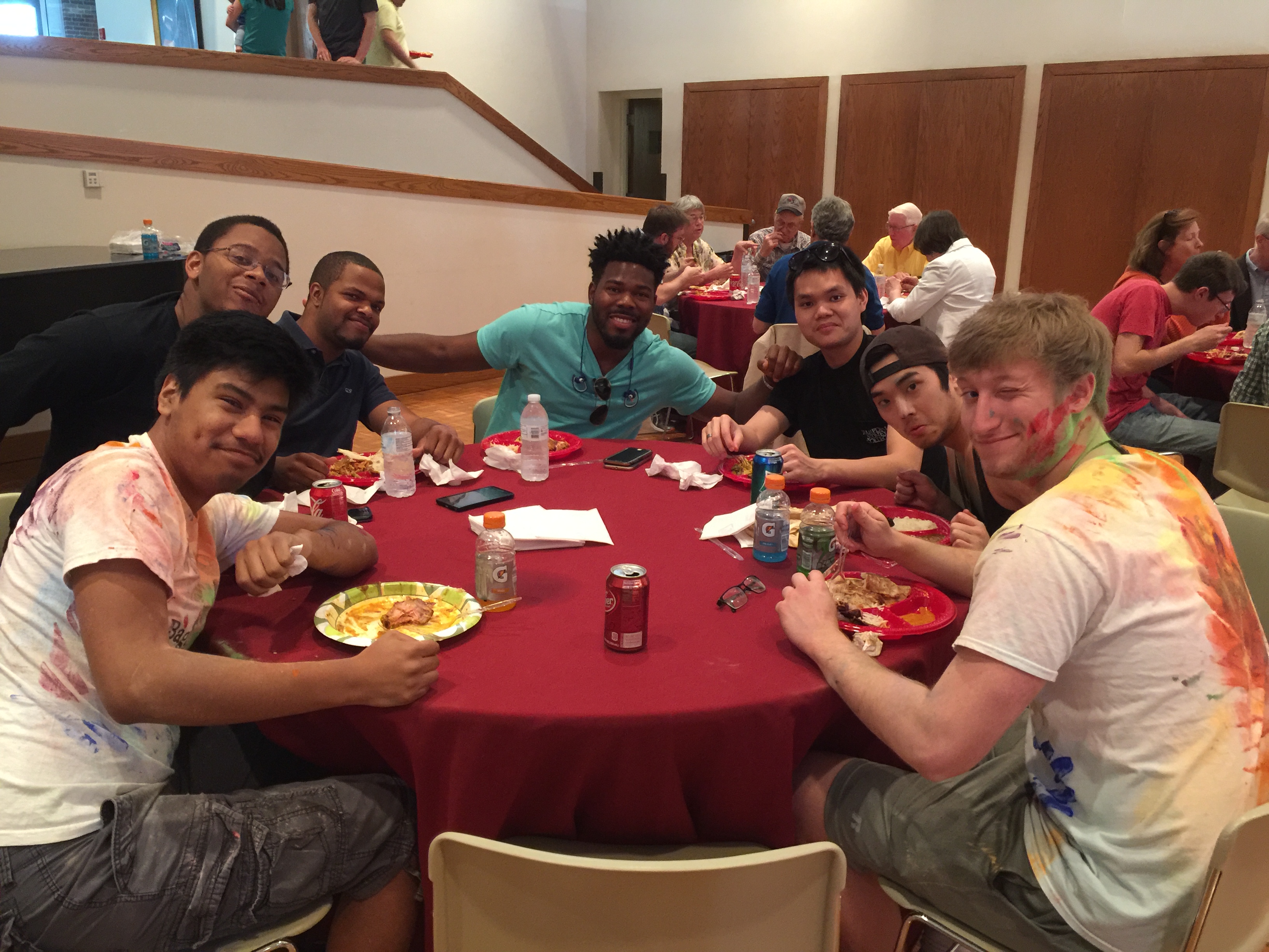 students eating at holi festivities