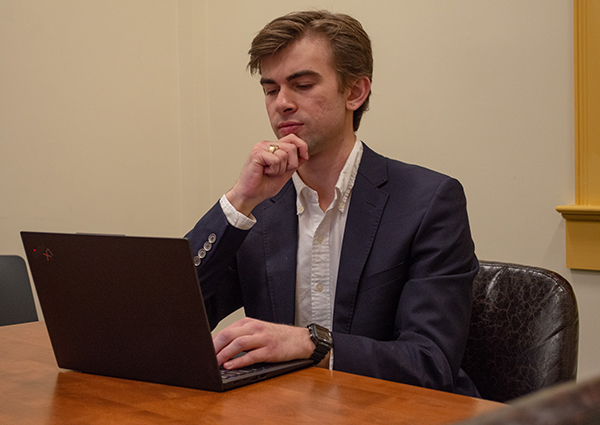 Andrew Parker looking at a computer screen