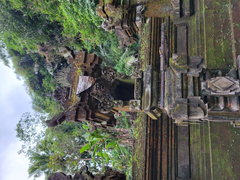 ancient Indonesian stone temple covered in moss