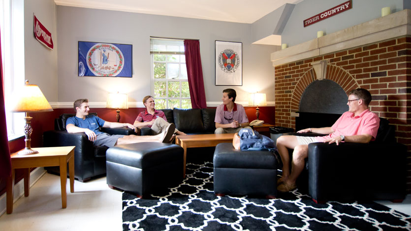 Students lounging in a dorm lounge area
