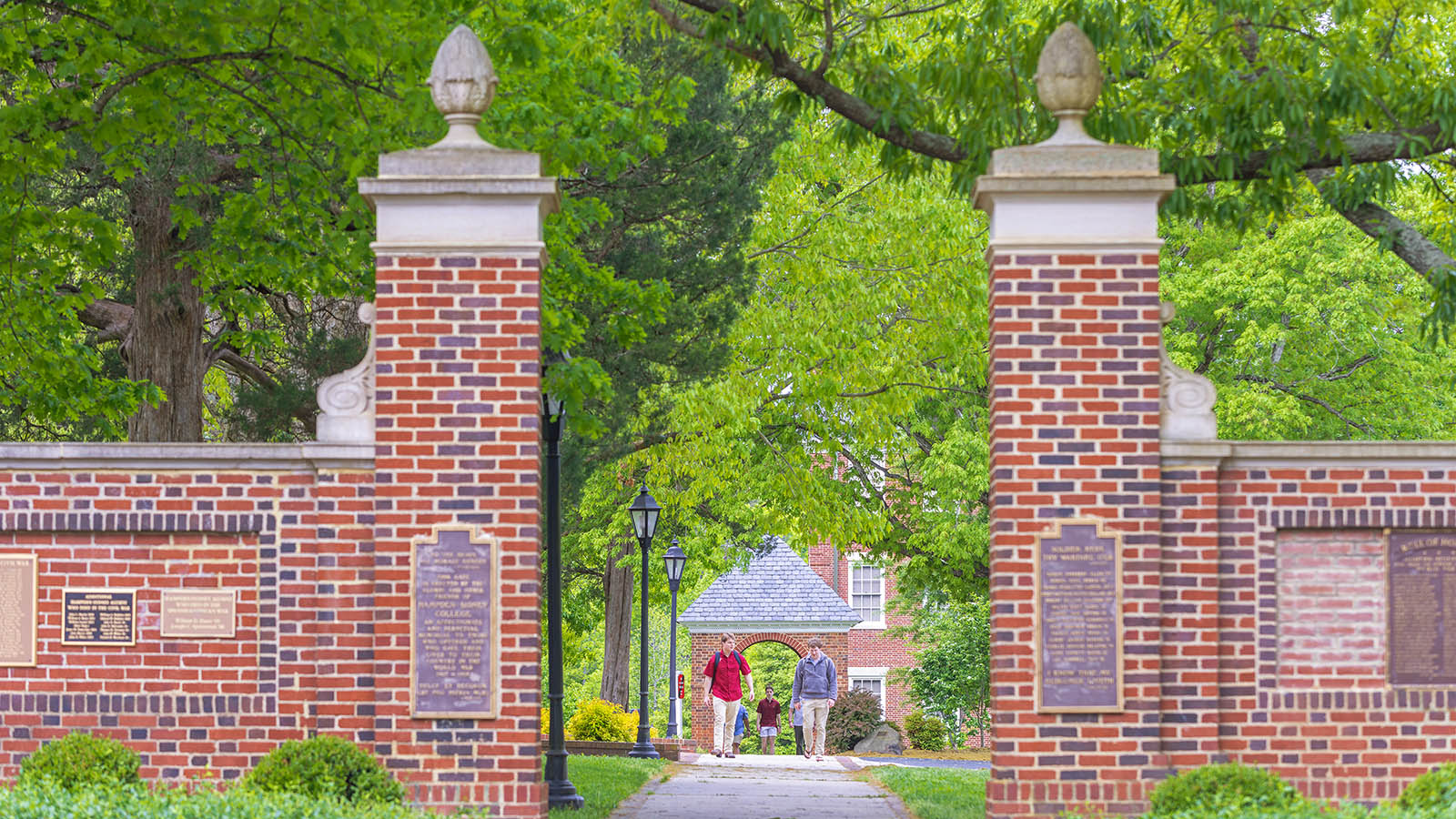 Students walking through Memorial Gates at Hampden-Sydney College