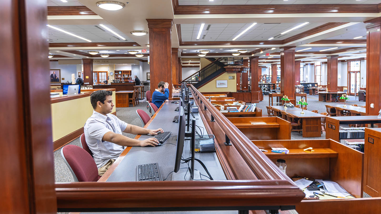 Students working at computers in the library