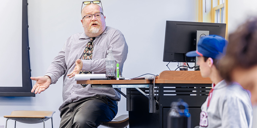 History professor leading an informal classroom discussion