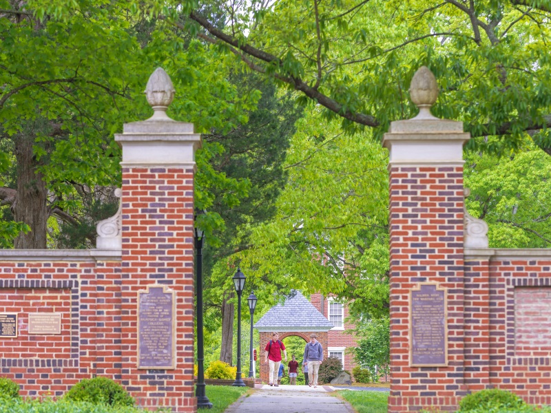students walking through memorial gates at  H-SC