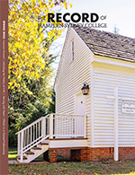 The Record magazine cover with a white historic cabin on it