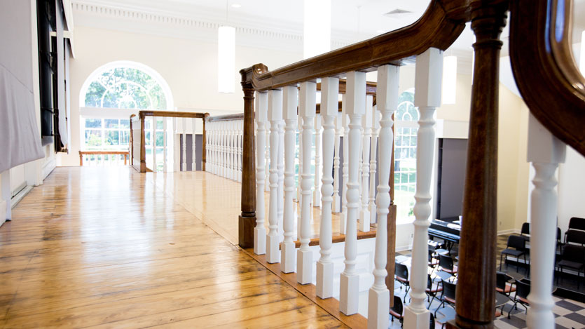 a winding staircase in the Brinkley Hall atrium