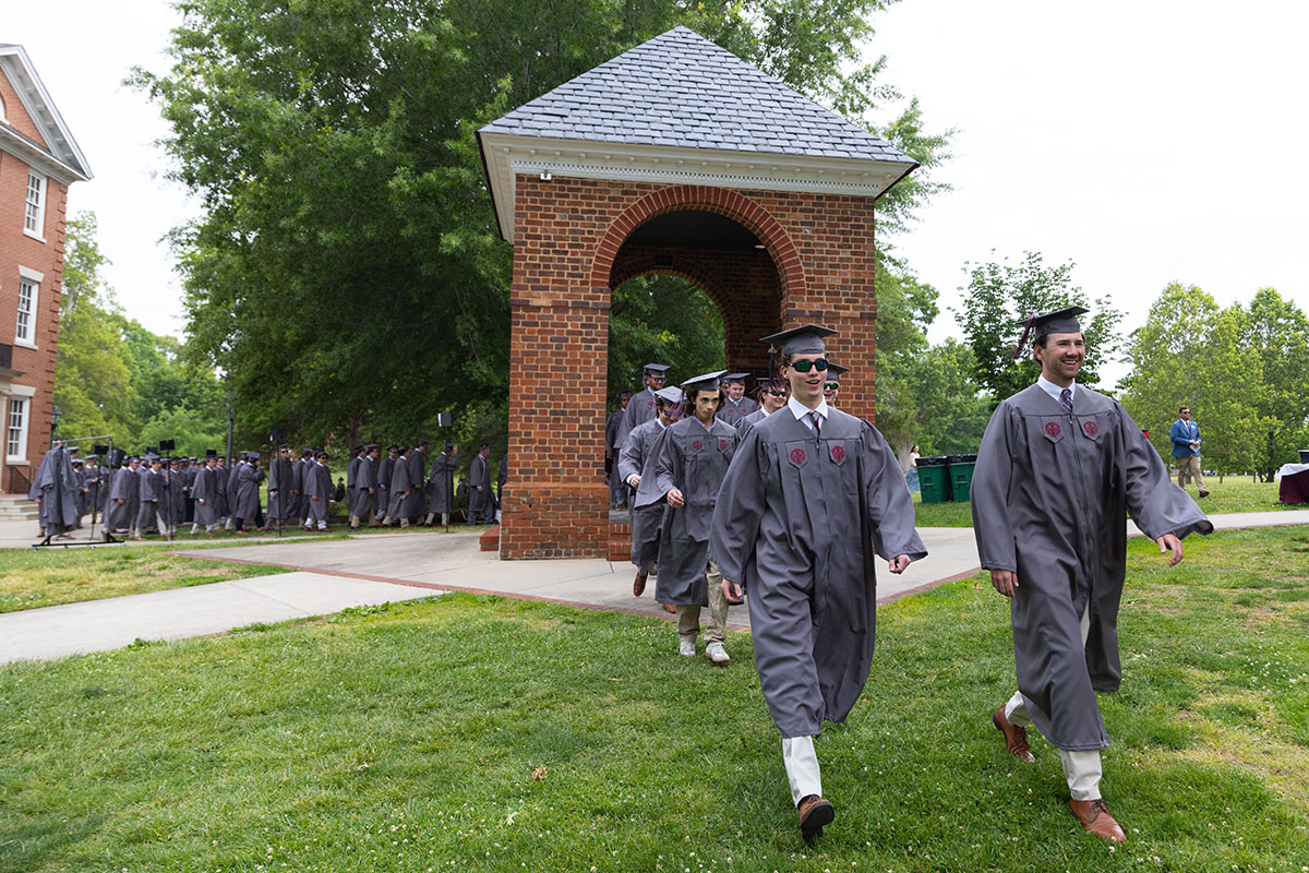 Class of 2026 processing through the Bell Tower to the commencement ceremony