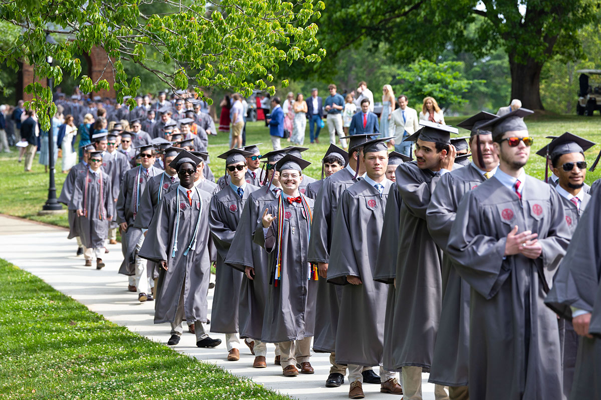 Class of 2026 in regalia processing to the commencement ceremony