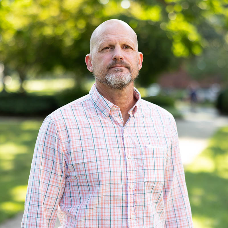 Dr. Justin Isaacs headshot