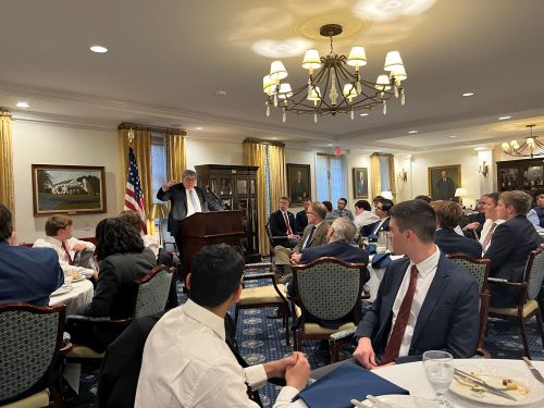 students gahered in a conference room