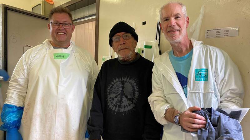 Alex Werth with colleagues preparing to dissect a rare whale