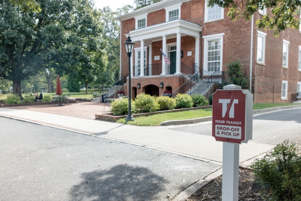 A sign in front of Graham Hall that reads "Tiger Transit"