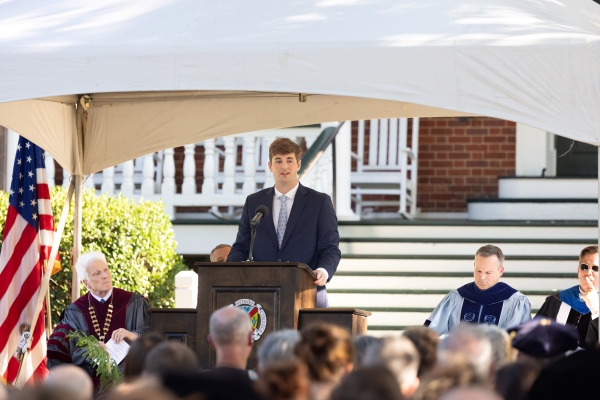 Student leader addressing the crowd at convocation