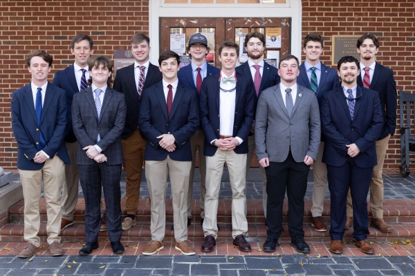 Phi Beta Kappa initiates standing on College Church steps