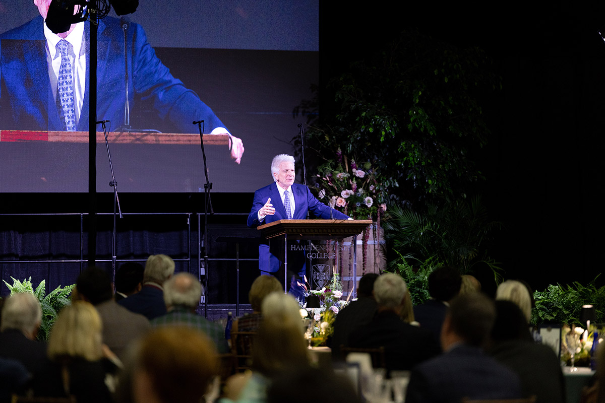 President Stimpert speaking at the podium at the 250th celebration dinner at Hampden-Sydney College
