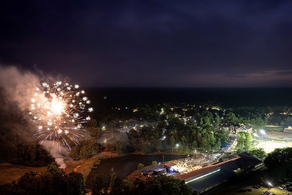 an aerial view of the fireworks and the celebrating crowd at the 250th celebration dinner at Hampden-Sydney College