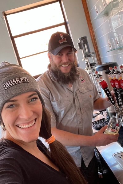 Will Correll with his partner at Buskey Cidery