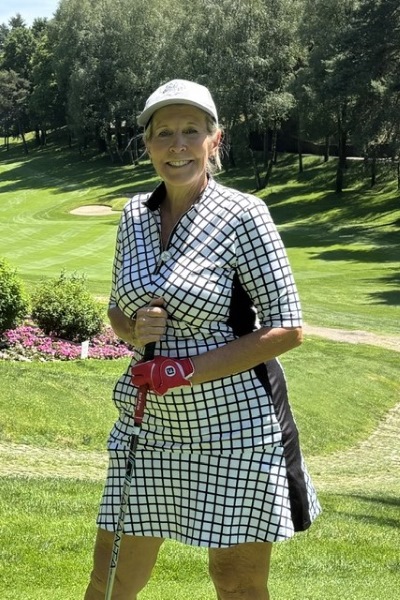 Leanna Everett standing on a golf course