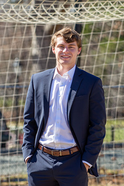 William Thornton standing in front of a soccer net