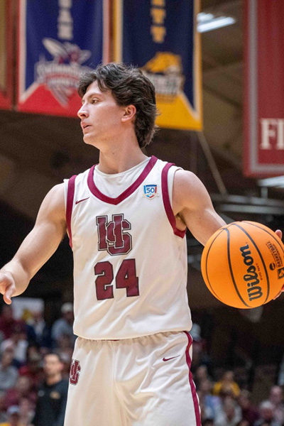 Adam Brazil on the court during a Tiger basketball game