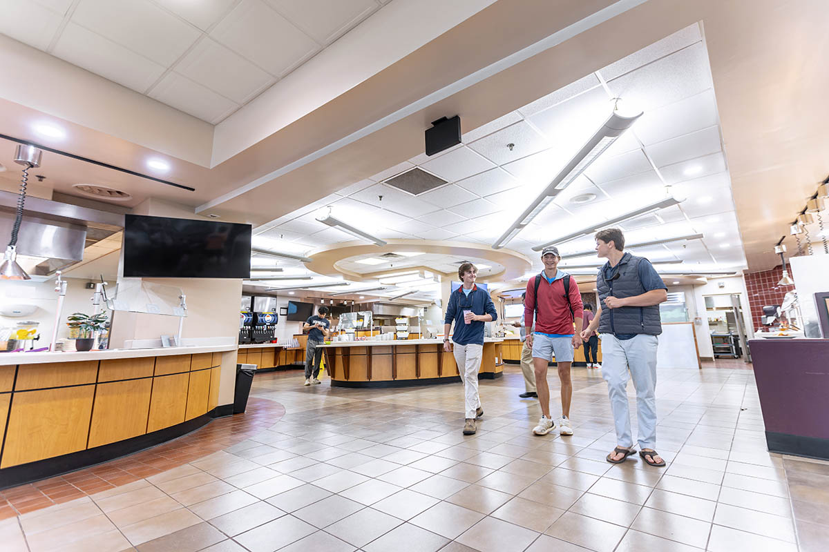 students walking through the line in the dining hall