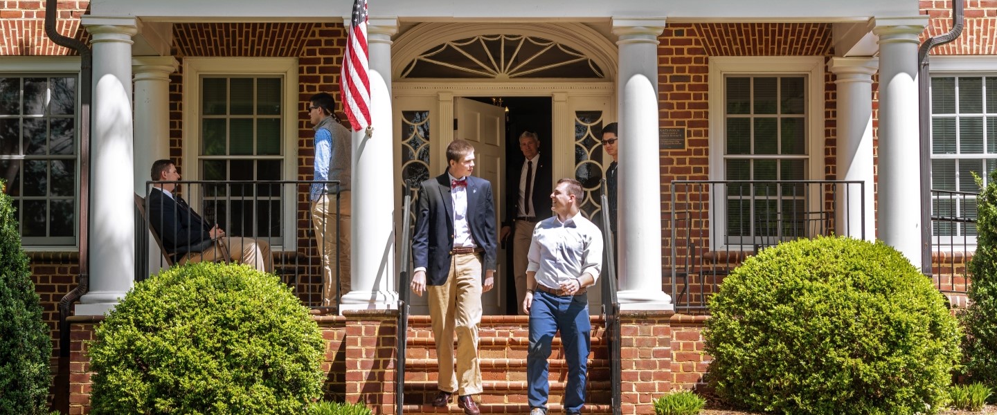 Hampden-Sydney students talking and walking down the Wilson Center steps