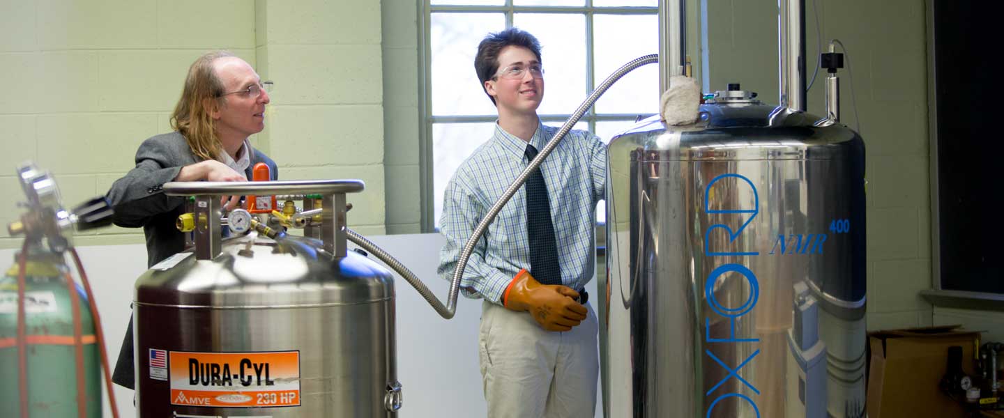 Dunn shows a student the equipment