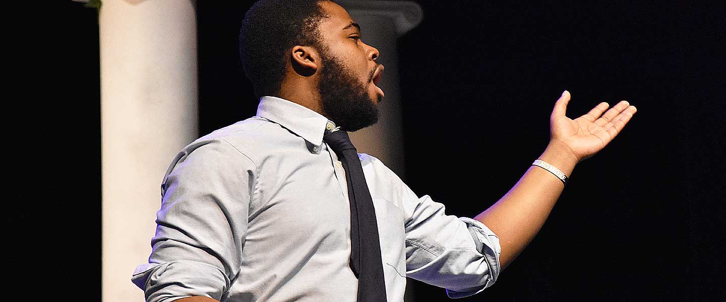 Student performing a mnonologue in a play
