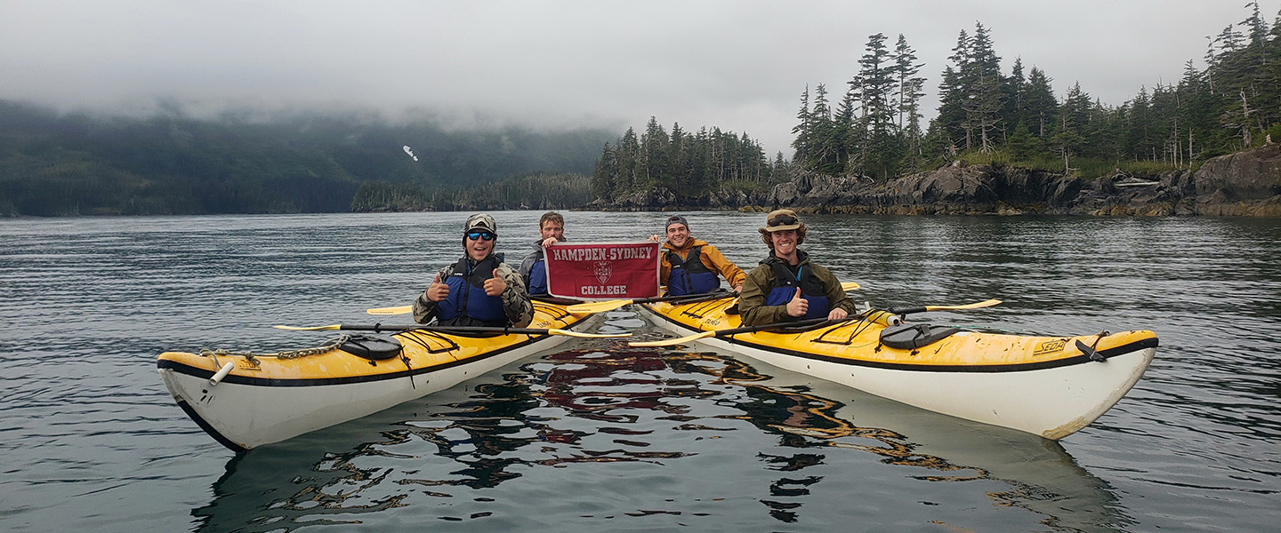 Students in kayaks on an Alaskan river