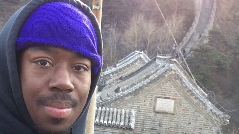 Shemar Blakeney in front of the Great Wall of China
