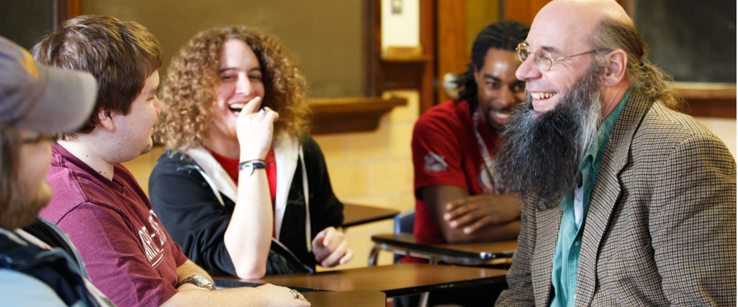Professor Janowski laughs with philosophy students