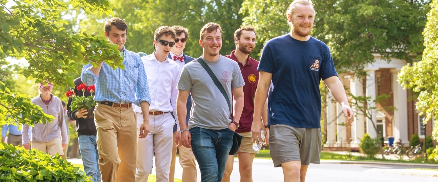 Group of guys walking through Hampden-Sydney College campus