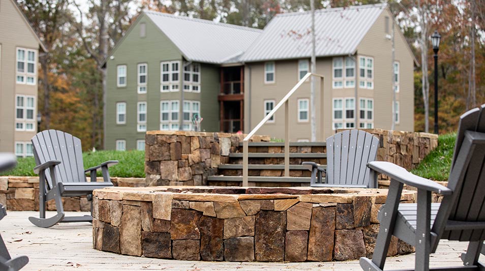 a community firepit and courtyard in the new residence hall buildingat Hampden-Sydney College